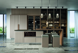 Cucina di lusso moderna su misura Materia di Martini Interiors in noce e finiture metallizzate, studio di interior design