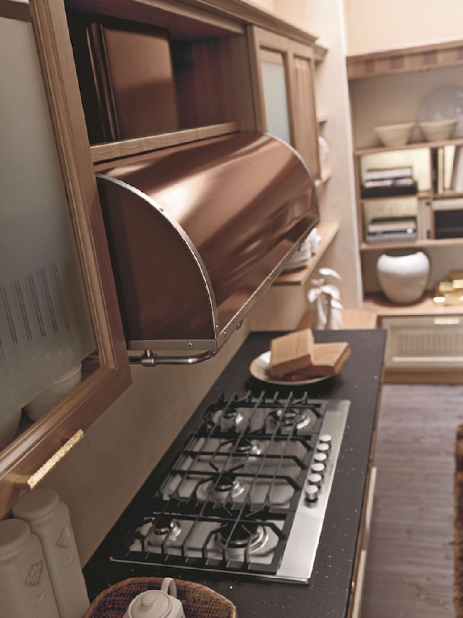 Cucina su misura moderna in noce crudo con finiture laccate, dettaglio cappa e zona cottura, design Martini Verona